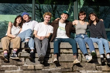students-sitting-on-rock-wall-2400x1600.jpg